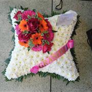 Cushion with name ribbon