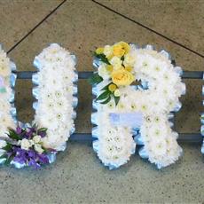 Multi coloured name frame- 7 letters- Beaufort local only