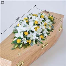 Yellow and White Rose and lily casket spray
