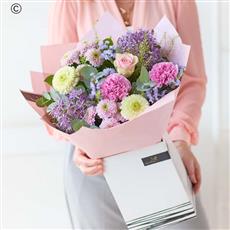 Interflora Thinking of you pastel Handtied bouquet size 1
